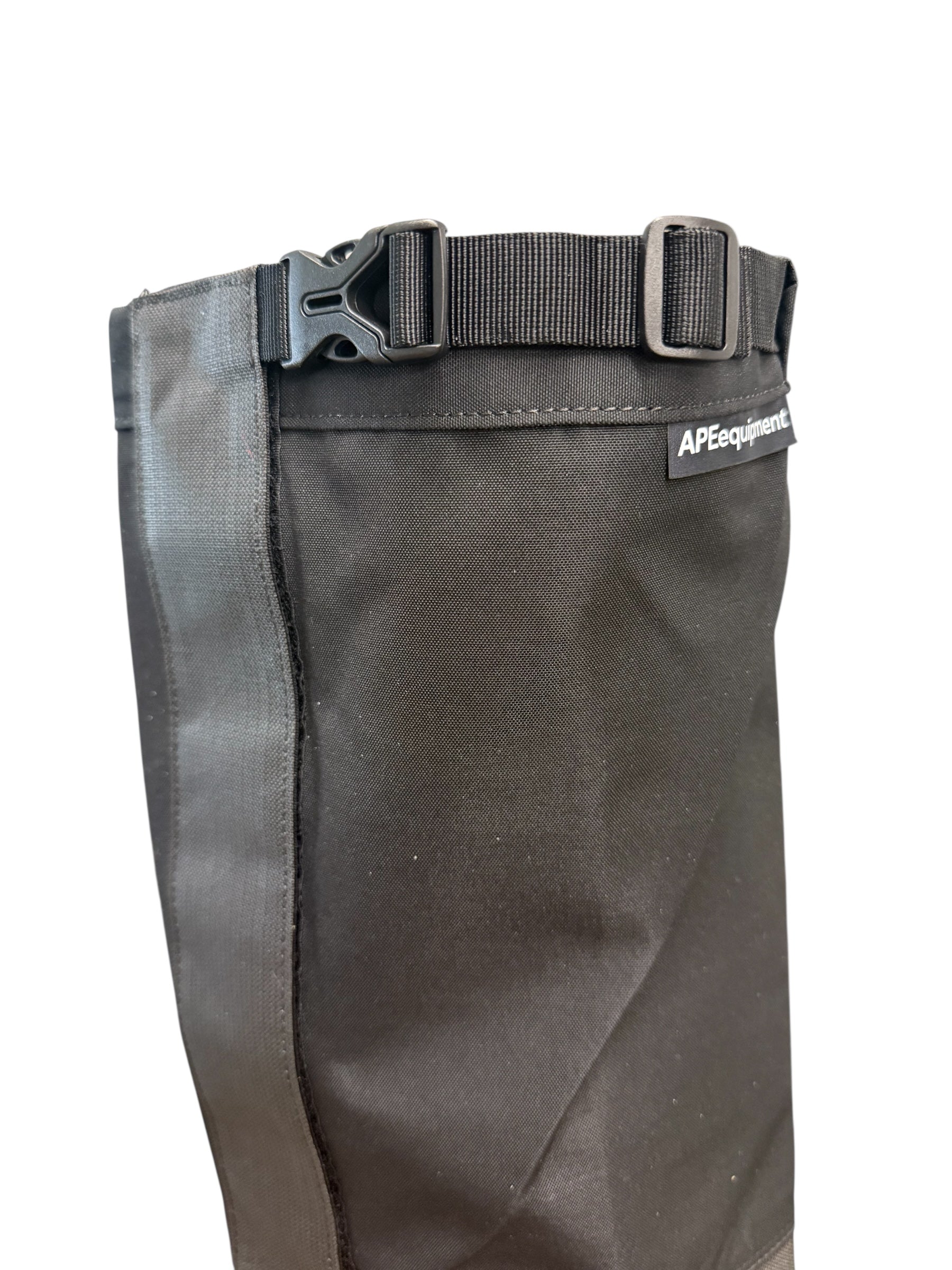 Dark gray pants with a belt and visible brand logo on a white background